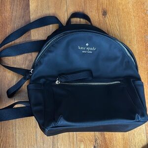 Kate Spade Black Backpack with Structured Design and Zip Closure